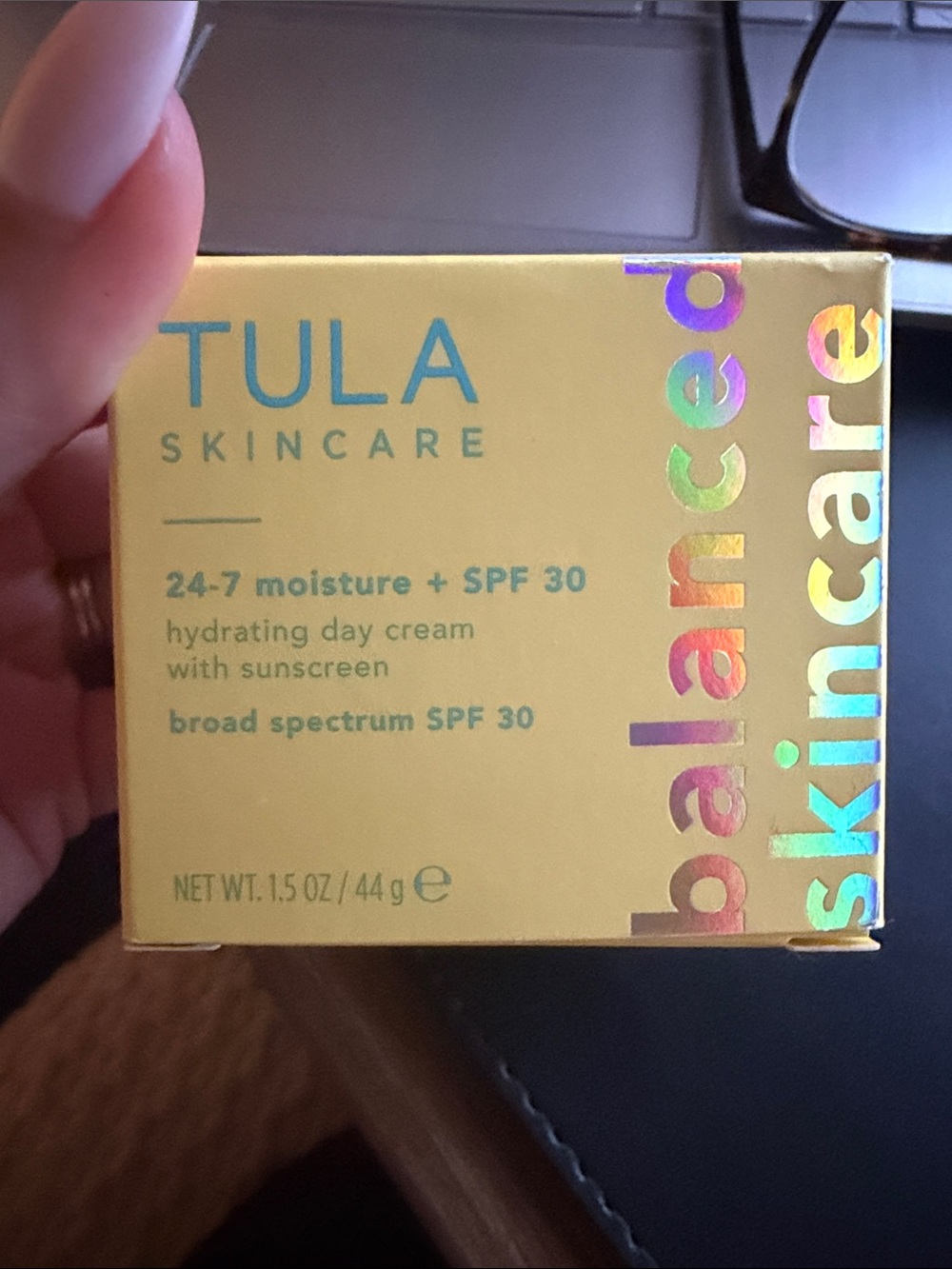 Tula Skincare Moisturizer Box in Yellow with Teal Text and Holographic Accents